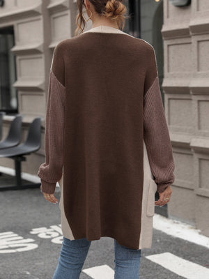 Colorblock knit longline cardigan in sand with beige side panels and brown main body.