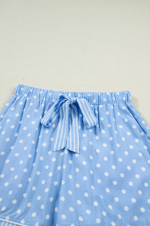 Blue polka dot viscose pajama shorts with drawstring and white stripe tie.
