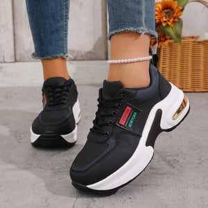 Black lace-up sneakers with chunky white sole and "Fashion New York" detail