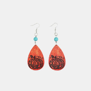 Autumnal pumpkin wood dangle earrings with turquoise beads and silver hooks.