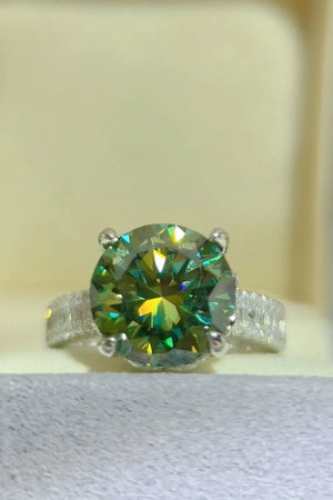 Emerald cut halo engagement ring in dark green sterling silver with pave band.