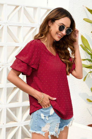 Deep Red Swiss dot blouse with tiered short sleeves and V-neck.