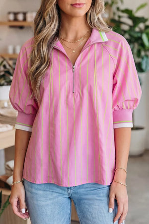 Pink striped half-zip polo shirt with puff sleeves and contrast cuffs