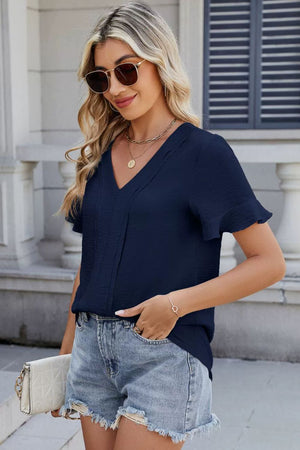 Dark navy textured v-neck blouse with ruffle sleeve detail