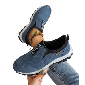 Blue suede-like round toe slip-on sneakers with "Outdoor" and "Sport" accents.