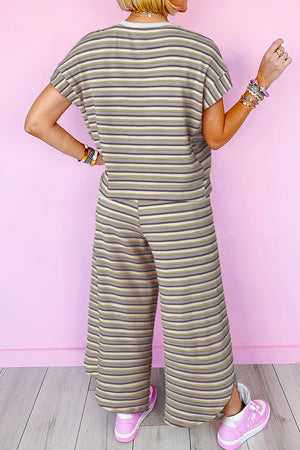 Cotton culotte jumpsuit with rainbow stripes and drawstring waist.