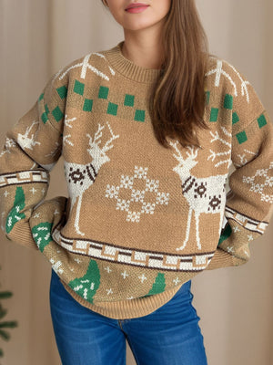 Tan acrylic knit sweater with reindeer and snowflake motif, crew neck, long sleeves.