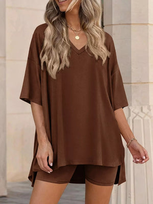 Brown V-neck two-piece set with oversized top and biker shorts.