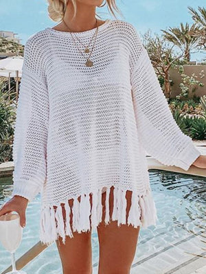 White open-knit acrylic beach cover-up with fringe hem and long sleeves.