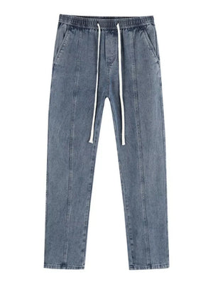 Air Force Blue relaxed fit jeans with drawstring and front seams.