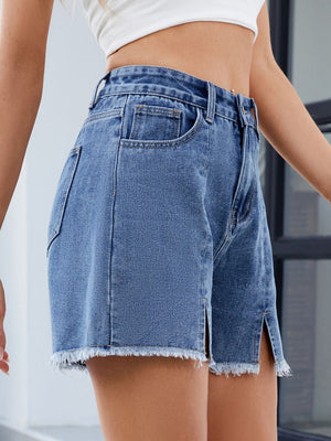 Light blue denim shorts with frayed hem and split front detail.