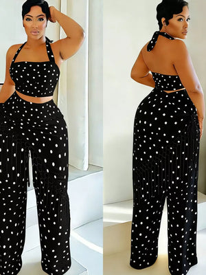 Black polka dot cami and fringe wide-leg pant set with halter neckline.