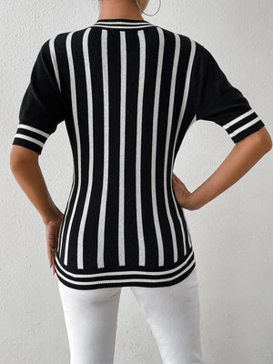 Black and white vertical stripe knit tee with ribbed trim details.