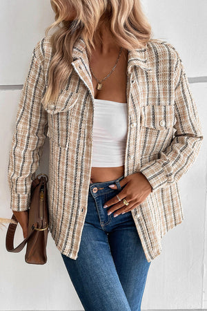 Textured tweed shirt jacket in tan with buttoned pockets and pearl buttons.