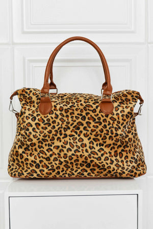 Leopard print satchel bag with brown leatherette handles and trim