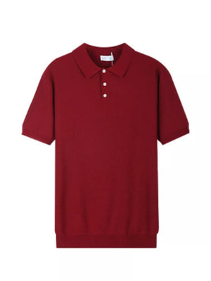 Burgundy ribbed short sleeve polo shirt with classic collar and three-button placket.