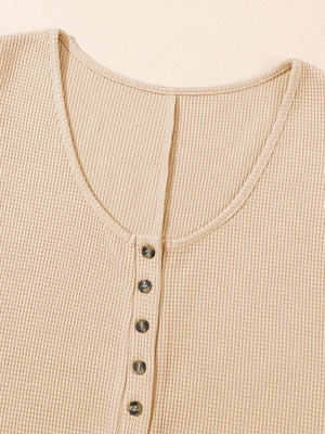 Waffle knit button-down romper in Camel with a scoop neckline and button details.