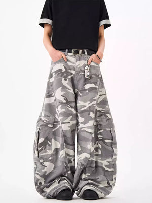 Urban camo oversized cargo sweatpants with multiple pockets and a relaxed fit.