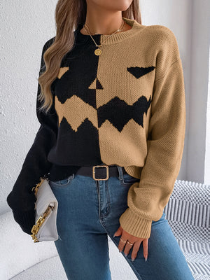 Split-Face Pumpkin Knit Sweater in black and camel with a crew neck and long sleeves.