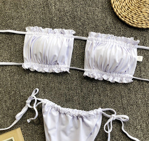 White ruffled bandeau bikini set with tie-side bottoms