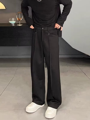 Men's black relaxed fit wide leg sweatpants with front seam detail.