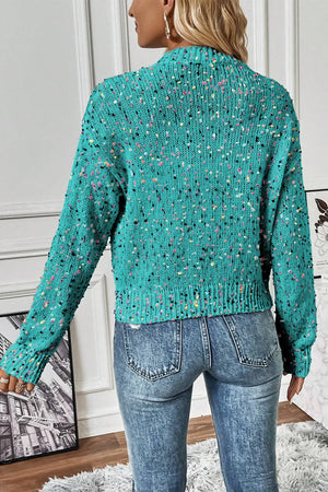 Confetti knit button-up cardigan in turquoise with a speckled multicolor pattern.