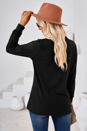 Black Henley Neckline Jersey Top with long sleeves.