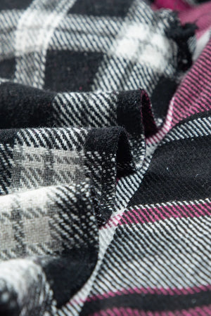 Colorblock plaid shacket in black, white, grey, and pink.