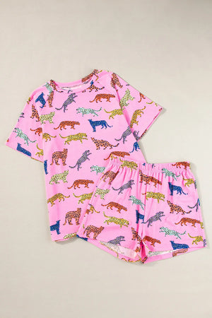 Pink leopard print loungewear set with short sleeve top and shorts.