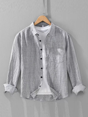 Grey linen textured long sleeve button-up shirt with a chest pocket.