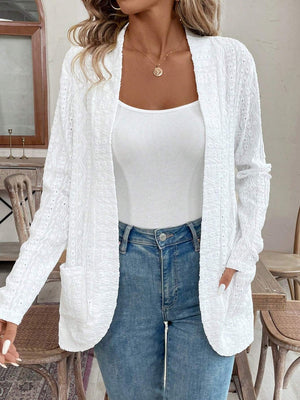 White open-weave embroidered cardigan with pockets, open front, and long sleeves.