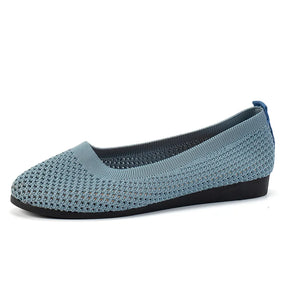 Pastel blue breathable knit ballet flats with a rounded toe and flexible sole.