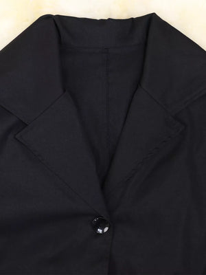 Black midi dress with lapel collar, button detail, and cuffed sleeves.