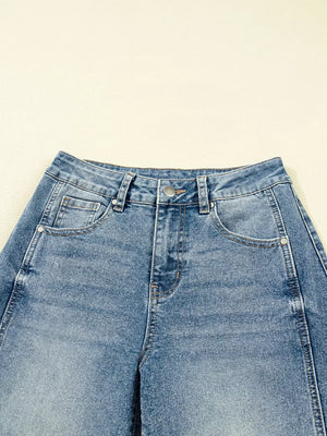 Vintage-inspired high-waisted seam jeans in light wash denim with classic five-pocket styling.