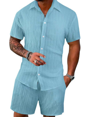 Textured pastel blue resort shirt and shorts set with button front and spread collar.