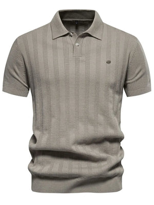 Beige textured ribbed knit polo shirt with short sleeves and a button placket.