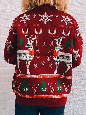 Red acrylic turtleneck sweater with intarsia reindeer and snowflake pattern.