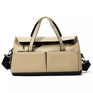 Khaki nylon travel duffel bag with multiple exterior pockets and black trim.