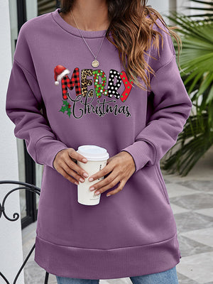 Purple tunic sweatshirt with festive "Merry Christmas" graphic and Santa hat detail.