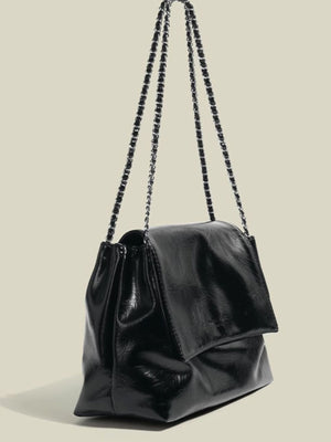 Black crinkled pu leather shoulder bag with a chain strap