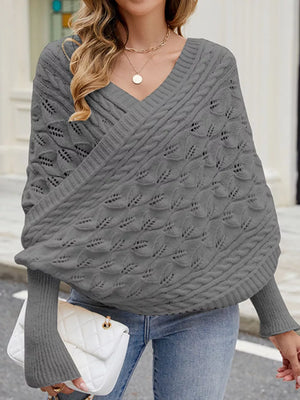 Cable Knit Batwing Sleeve Sweater in Black, model styling view