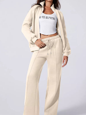 Beige cotton zip-up jacket and drawstring wide-leg pants set with seam detail