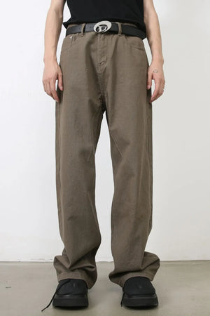 Taupe wide-leg denim trousers with a relaxed fit and casual styling.