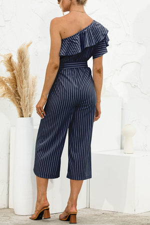 Dark blue striped ruffle one-shoulder culotte jumpsuit with belted waist.