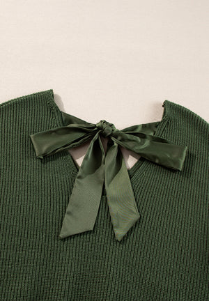 Dark green ribbed knit sweater with a satin bow detail at the back neckline.