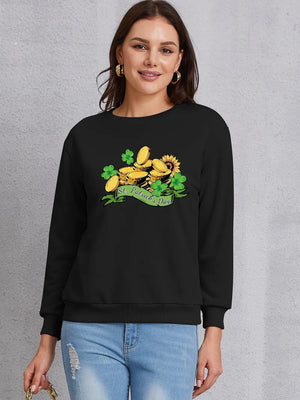 Black St. Patrick's Day graphic sweatshirt with gold coins, shamrocks, and sunflower detail.