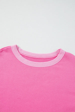 Fuchsia pink cotton loungewear top with contrast trim crew neck.
