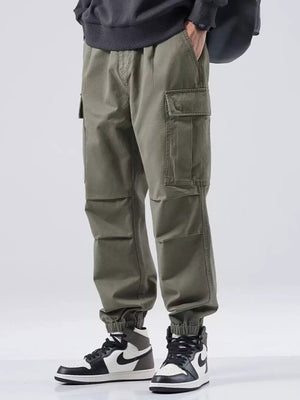 Plus-size relaxed fit cargo sweatpants in Army Green with elastic cuffs and multiple pockets.