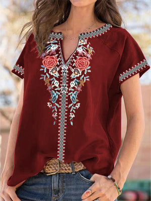 Burgundy floral embroidered notched v-neck short sleeve blouse with contrast trim