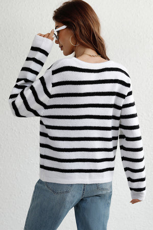 White and black striped knit cardigan with gold buttons